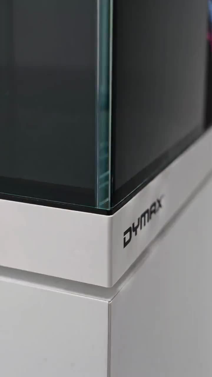 DYMAX IQ9 Mini drop-off reef aquarium, lit and fully stocked with corals and marine fish